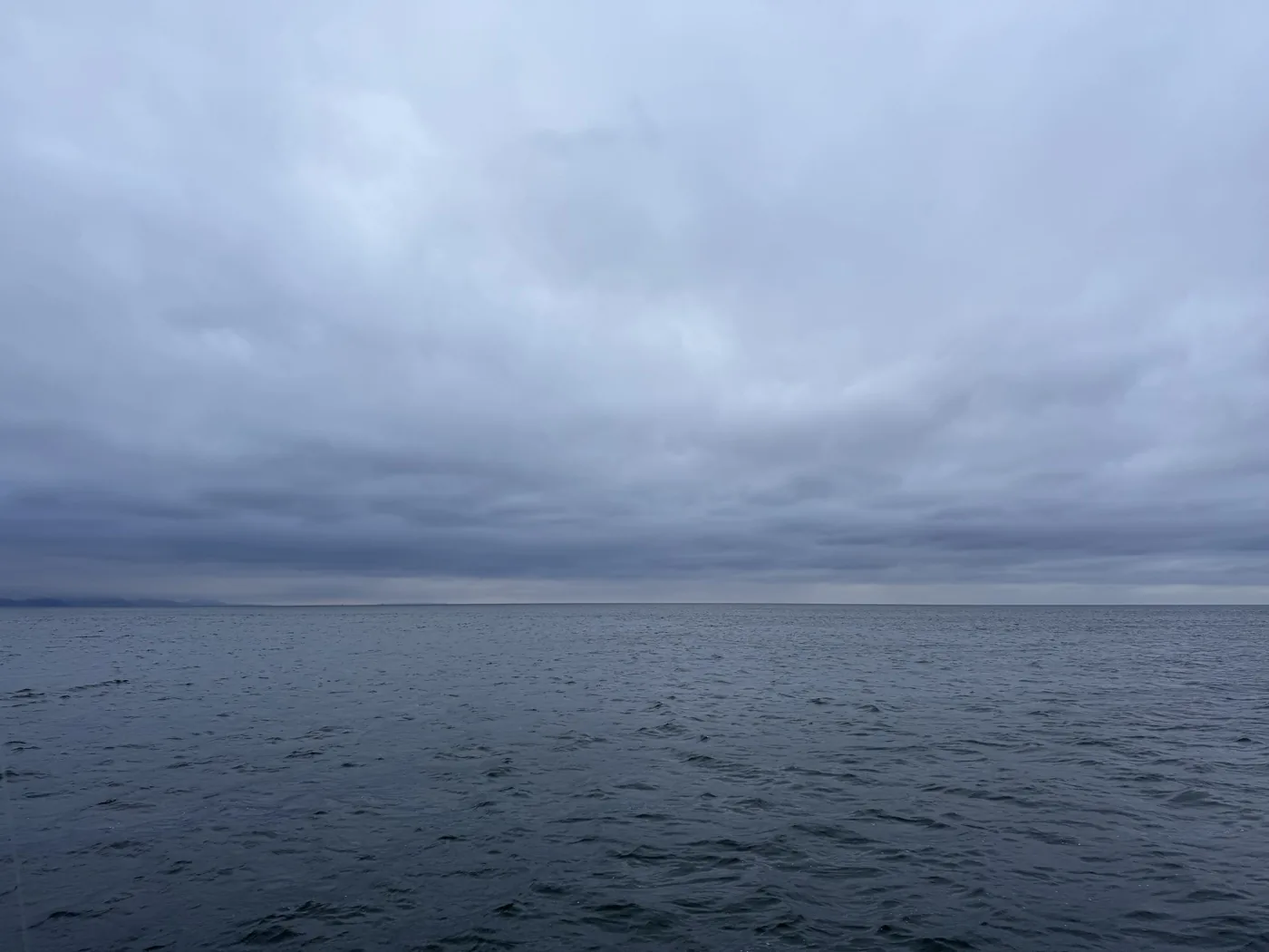 Overcast Sagami Bay, the surface choppy from the wind