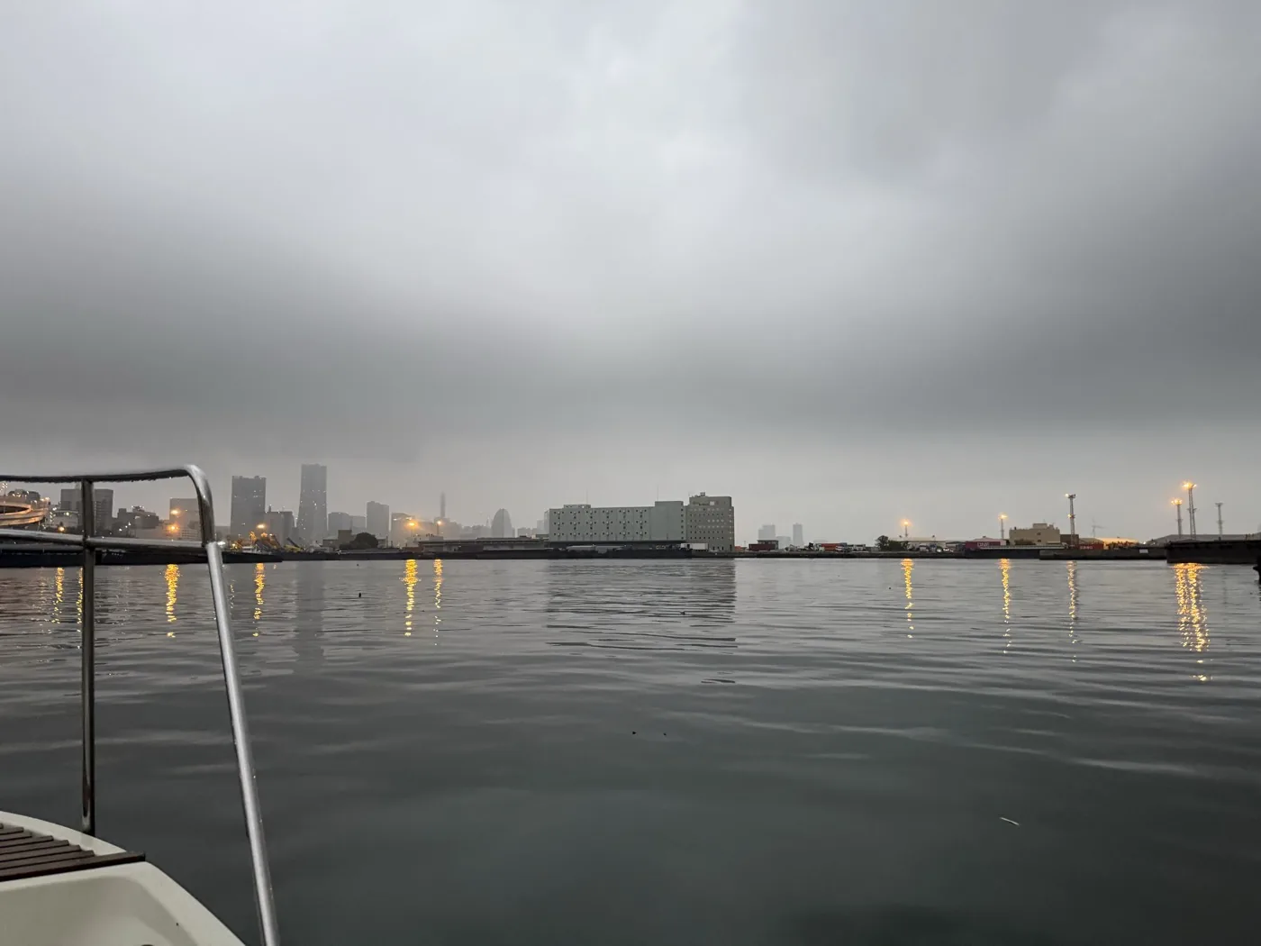 Overcast, swelling Tokyo Bay with the Yokohama skyline in the distance